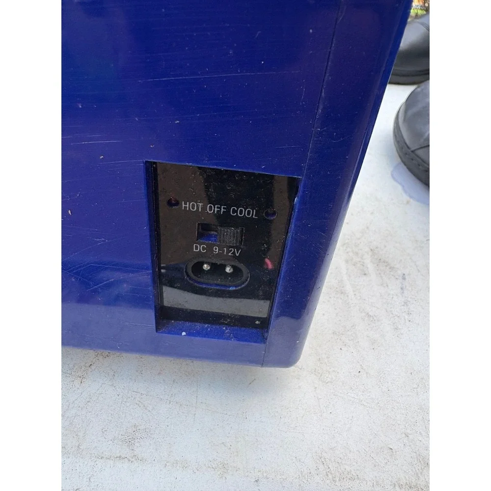 Sunbeam mini-fridge, a compact and portable cooling and warming unit.